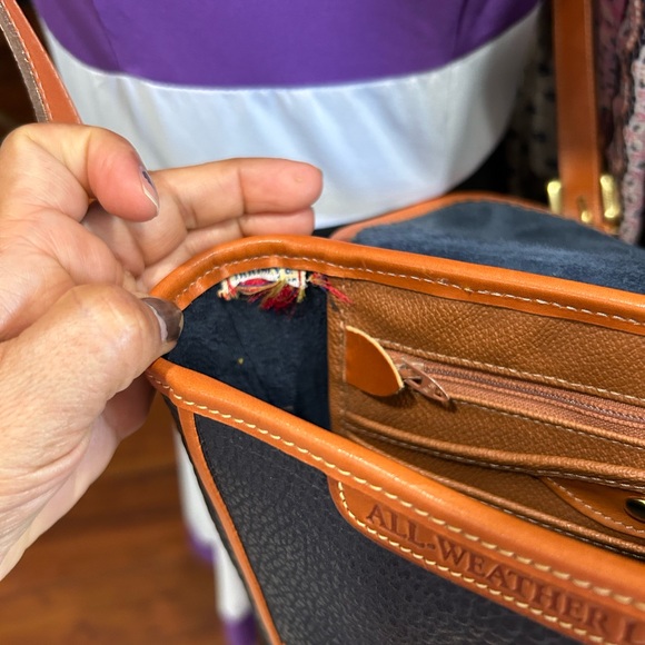 Dooney & Bourke Black and Tan Crossbody Bag with Signature Brass Lock - Picture 11 of 14